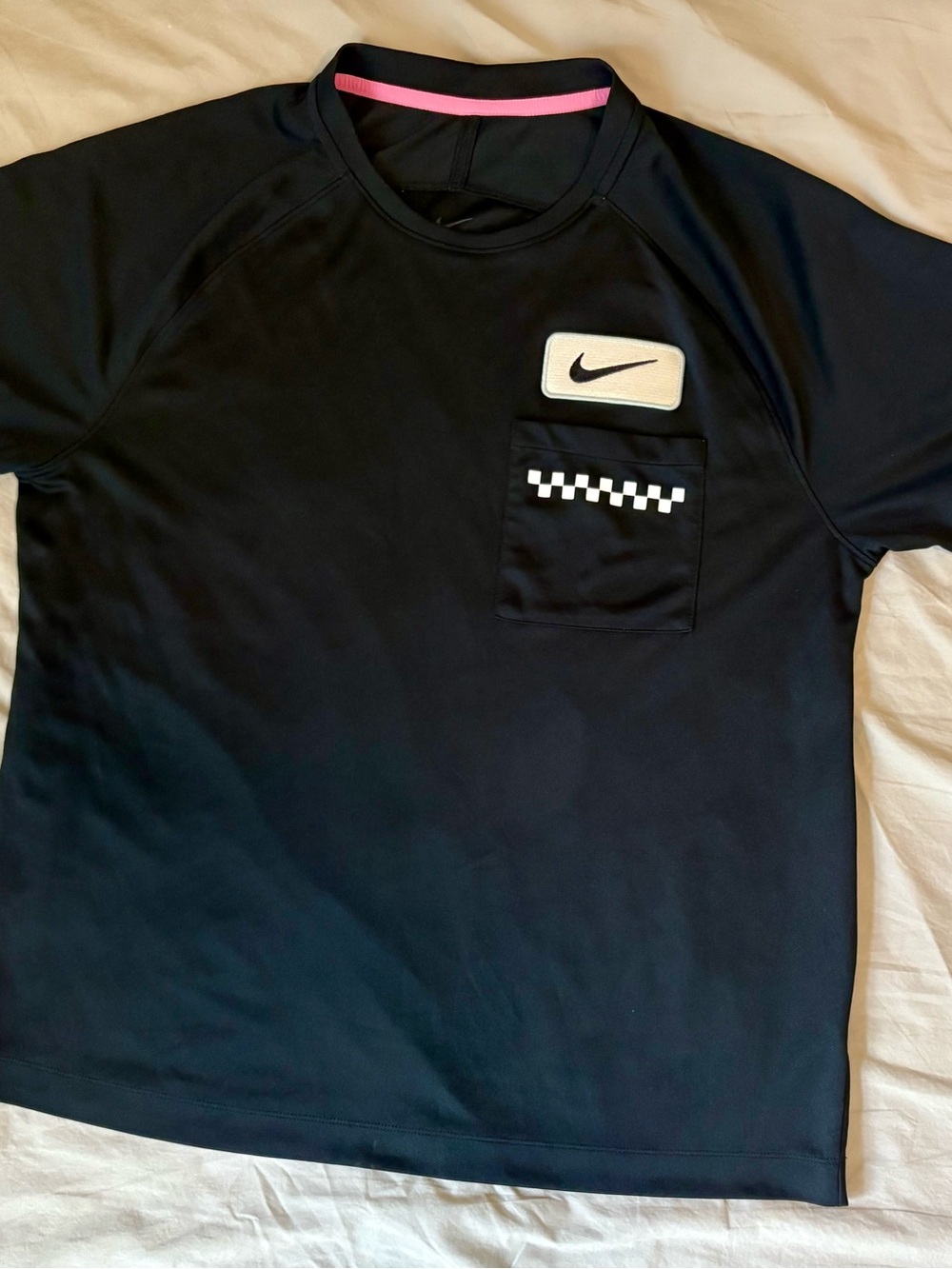 Nike Black Short-Sleeve Shirt with Checker Pocket and Pink Neck Trim